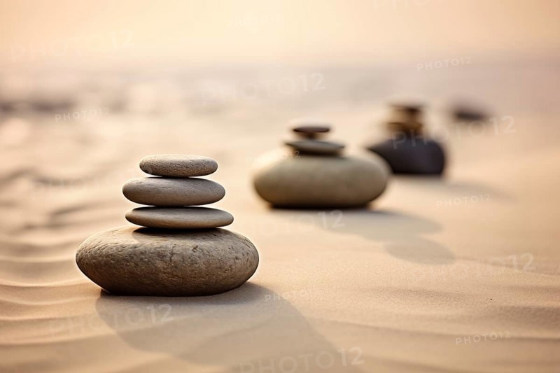Zen stones stacks on sand waves in a minimalist setting for balance and harmony. Balance, harmony, and peace of mind, wellness, meditation, and spirituality concept, AI generated