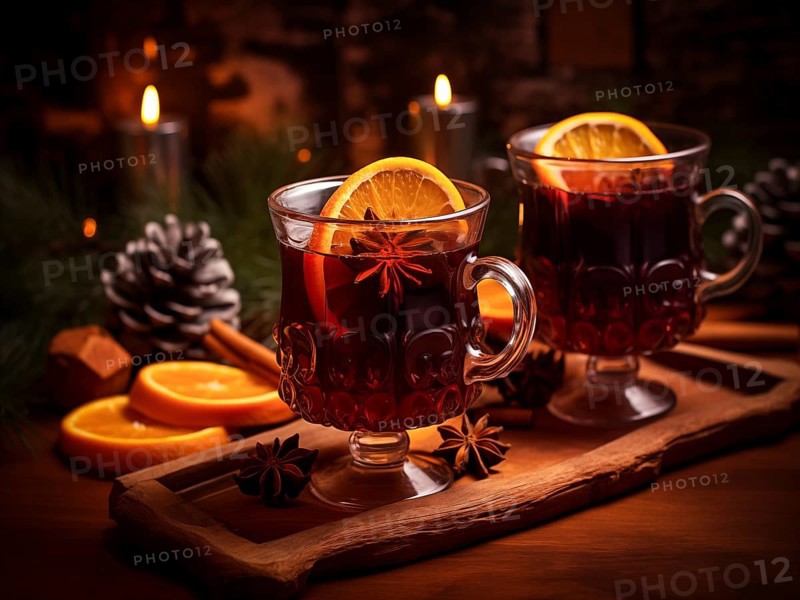 Two glasses of traditional mulled wine with orange and cranberry garnishes on a cozy Christmas table. The background is blurred with bokeh lights and candles, creating a warm and festive atmosphere, AI generated