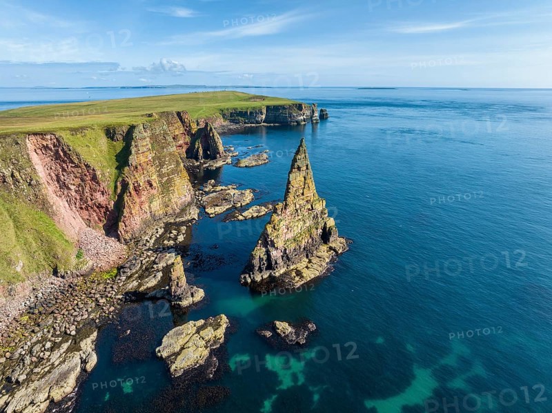 Aerial view of the rugged coastal landscape with the Duncansby Stacks, Duncansby Head coast, County Caithness, Scotland, United Kingdom, Europe