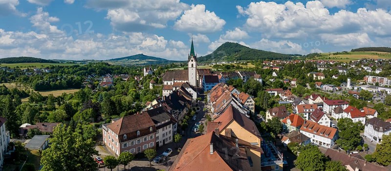Aerial panorama of the old town of Engen, on the horizon the Hegauberge Hohenhewen and Hohenstoffeln, district of Konstanz, Baden-Württemberg, Germany, Europe