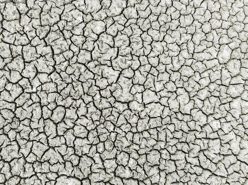Cracked earth in the marshland near Sanlucar de Barrameda. Aerial view. Drone shot. Cadiz province, Andalusia, Spain, Europe