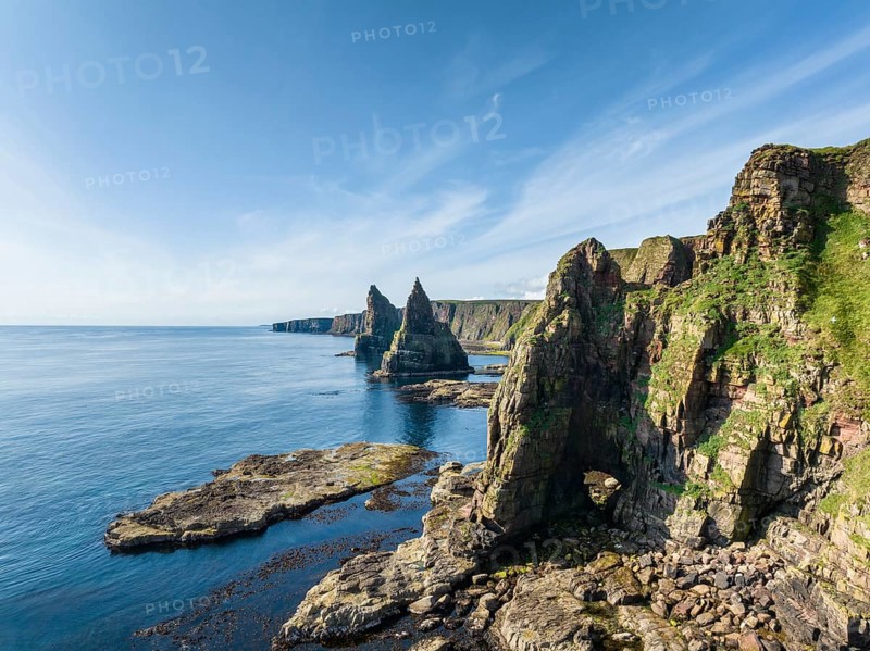 Aerial view of the rugged coastal landscape with the Duncansby Stacks, Duncansby Head coast, County Caithness, Scotland, United Kingdom, Europe