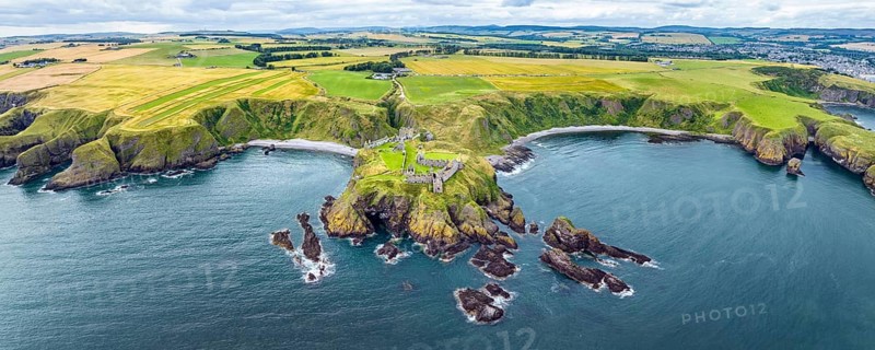 Aerial panorama of Dunnottar Castle ruins on the North Sea coast, Stonehaven, Aberdeenshire, Scotland, United Kingdom, Europe