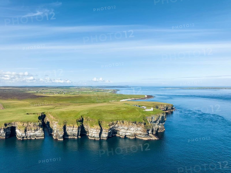 Aerial view of the rugged coastal landscape at Duncansby Head with the lighthouse, Scotland's north-eastern point, County Caithness, Scotland, United Kingdom, Europe