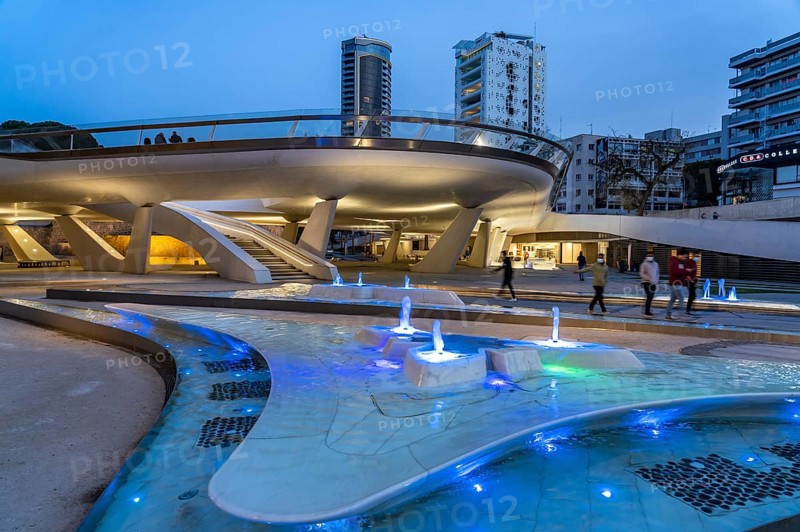 Modern architecture and colourfully lit fountains of Eleftheria Square at dusk, Nicosia, Cyprus, Europe