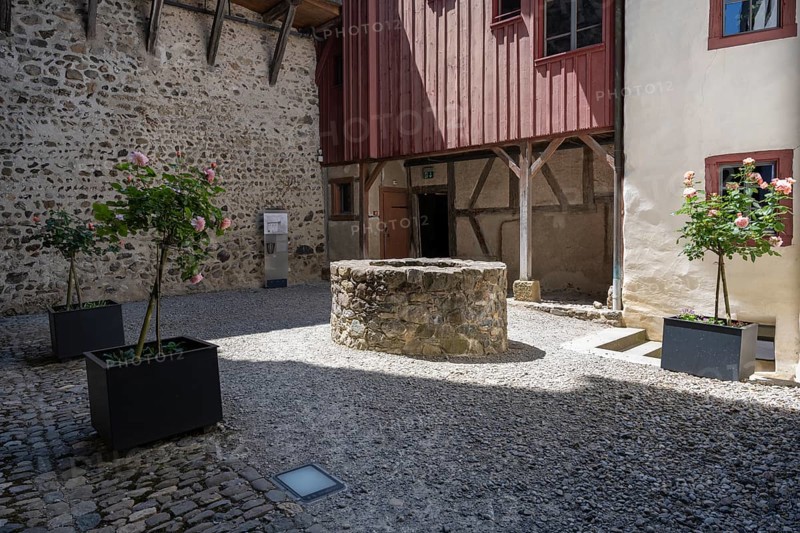 The inner courtyard with fountain of Hohenklingen Castle near Stein am Rhein, Canton Schaffhausen, Switzerland, Europe