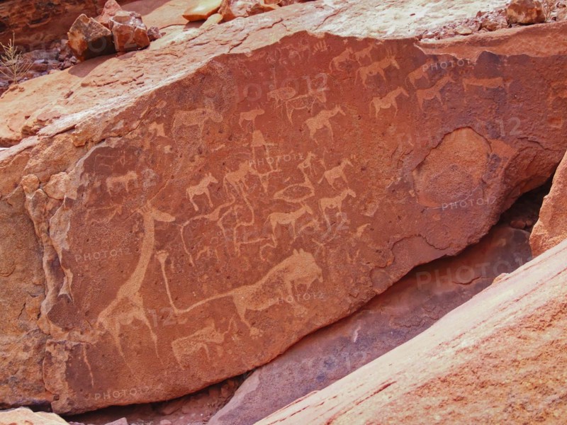 Rock paintings and rock carvings from Mesolithic cultures at a site in Twyfeltontein. Twyfelfontein, Kunene, Namibia, Africa