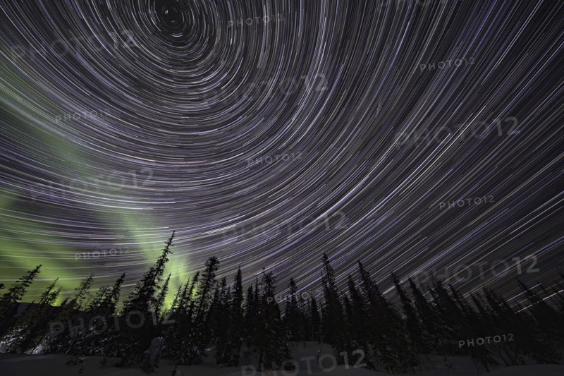 Star trails with Northern Lights over Pallas YllÃ¤stunturi National Park, Lapland, Finland, Europe