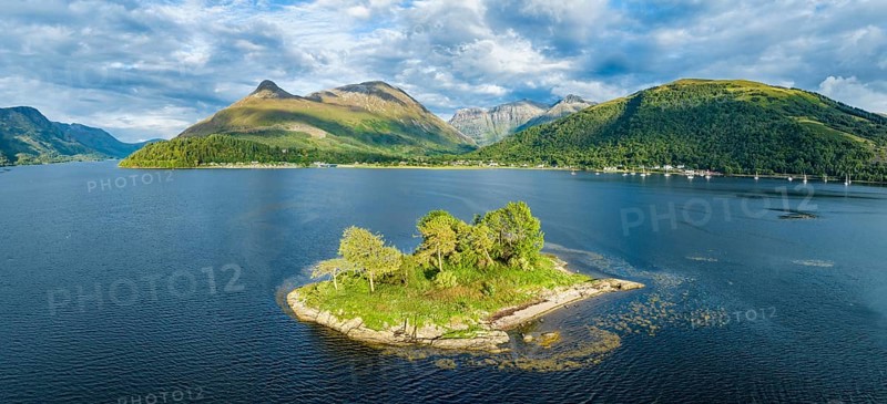 Aerial panorama of the western part of Loch Leven with the historic Isle of Discussion, above it the 742 metre high Pap of Glencoe, Highlands, Scotland, United Kingdom, Europe