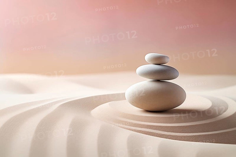 Zen stones stack on raked sand waves in a minimalist setting for balance and harmony. Balance, harmony, and peace of mind, wellness, meditation, and spirituality concept, AI generated