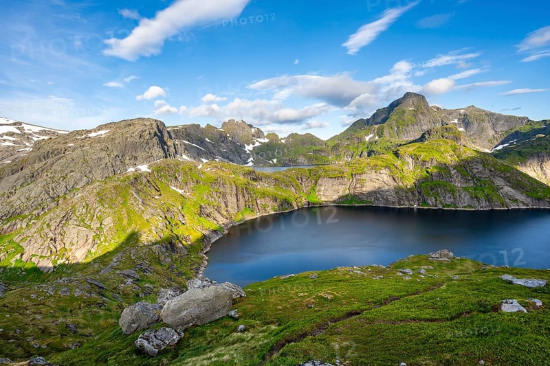 Mountain landscape with lake Tennesvatnet, at sunrise, in the back peak of Hermannsdalstinden, Moskenesoya, Lofoten, Nordland, Norway, Europe