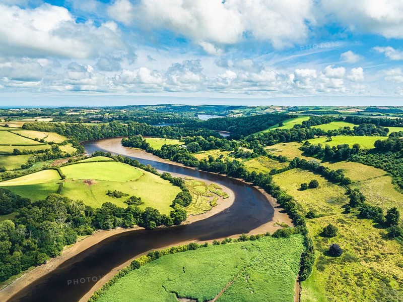 Sharpham Meadows and Marsh over River Dart from a drone, Totnes, Devon, England, United Kingdom, Europe