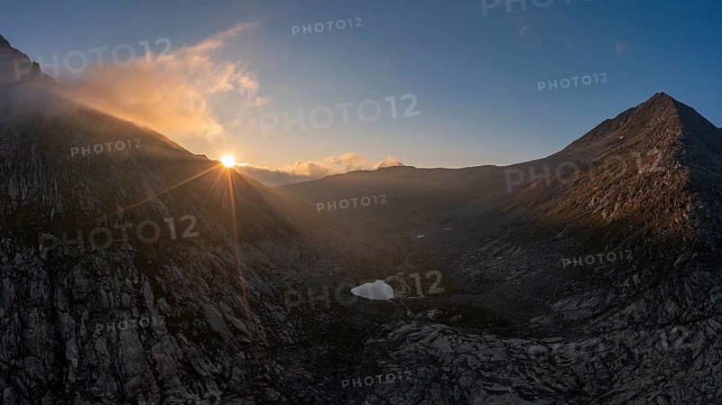 Aerial view of sunrise at Lake MÃ¤rjelen between Eggishorn and Strahlhorn on the Aletsch Glacier, Canton Valais, Switzerland, Europe