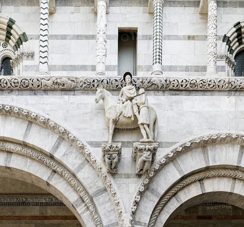 Saint Martin sharing his cloak for a beggar, copy, group of figures on the main façade, Romanesque, Cathedral, Cattedrale di San Martino also Duomo di Lucca, Lucca, Tuscany, Italy, Europe