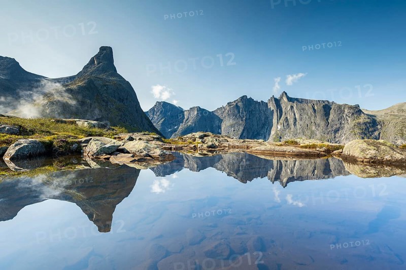 Romsdalshornet mountain reflected in mountain lake, Ã…ndalsnes, More og Romsdal, Norway, Europe