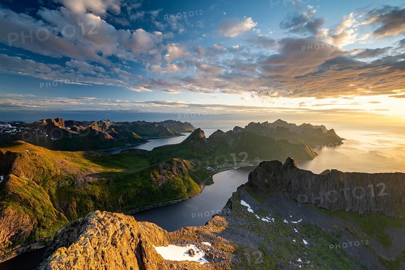 View over Senja's fjords and mountain peaks under the midnight sun, Mount Grytetippen, Senja, Norway, Europe