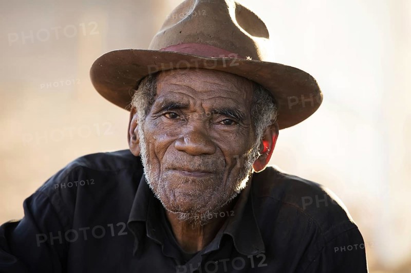 Close up portrait of Malagasy old man with hat in Bekopaka, Antsalova, Melaky, Madagascar, Southeast Africa, Africa