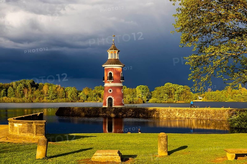 Lighthouse at the Fasanenschlösschen in Moritzburg with thunderstorm sky