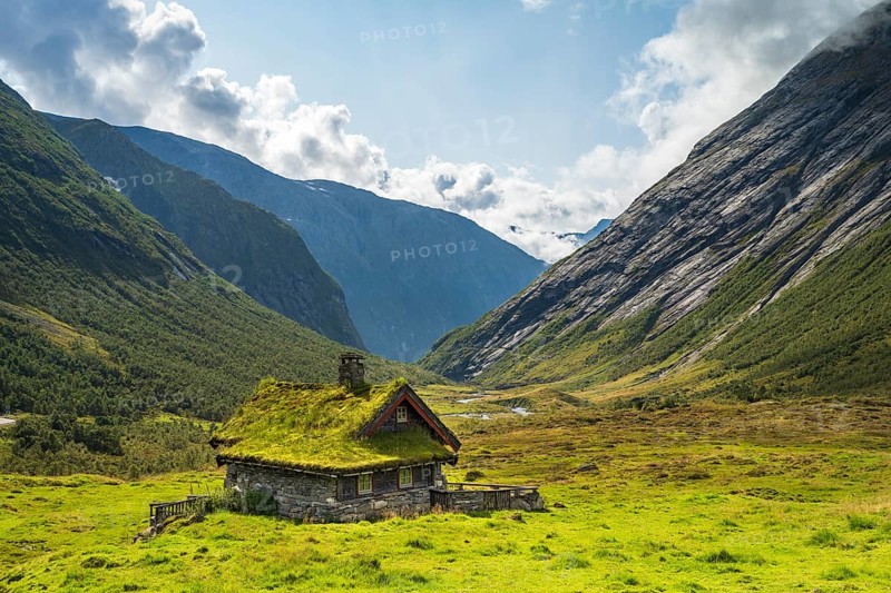 Traditional cottage with grass roof in mountain valley, Skjerdingsdalssaetra, Stryn, Norway, Europe