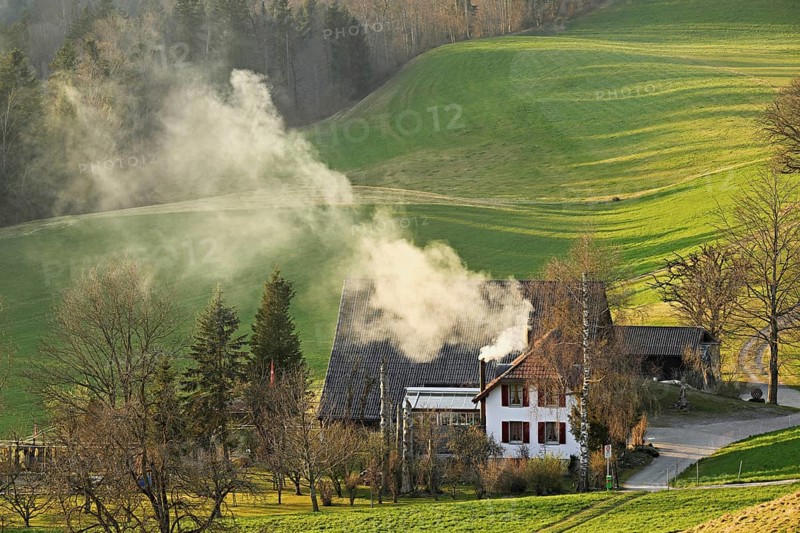 Farmhouse with smoking chimney, Hirzel, Canton Zurich, Switzerland, Europe