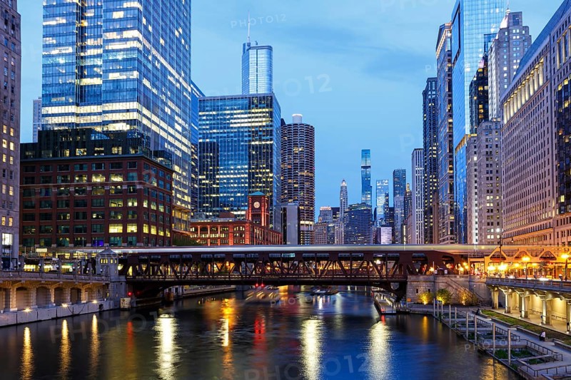 Skyline skyscrapers skyscrapers on the Chicago River bridge at night in Chicago, USA, North America