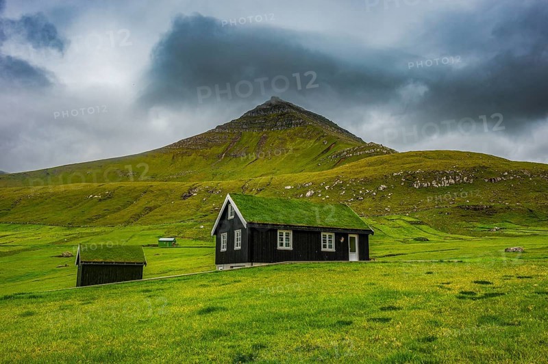 Lonely grass roofed house in Gjogv, Estuyroy, Faroe islands, Denmark, Europe
