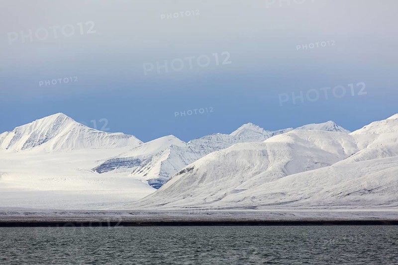 Snow covered mountains at Billefjorden, central fjord of the Isfjorden, Svalbard, Spitsbergen, Norway, Europe