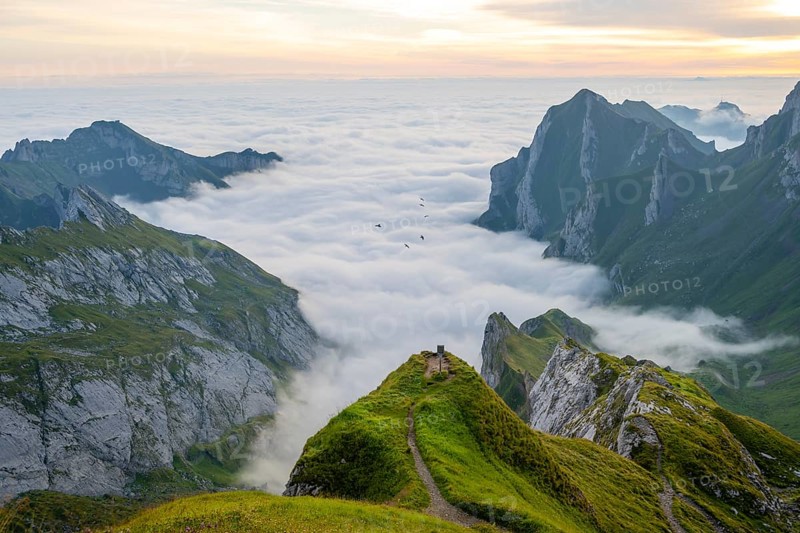 Alpstein, valley of Meglisalp at sunrise, high fog in the valley, SÃ¤ntis, Appenzell Ausserrhoden, Appenzell Alps, Switzerland, Europe