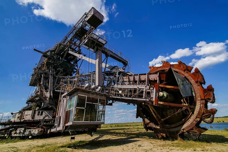 Ferropolis is an industrial museum and event venue in GrÃ¤fenhainichen, east of Dessau-RoÃŸlau, on a peninsula in Lake Gremmin, the former Golpa-Nord open-cast mine. Ferropolis is an anchor point of the European Route of Industrial Culture
