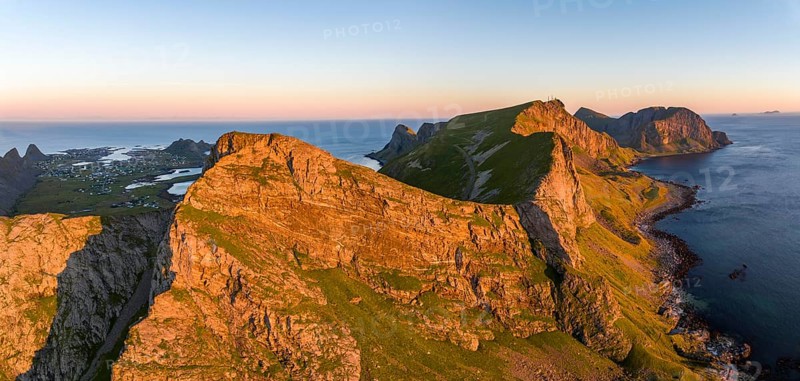 Coast and mountains in the evening light, Vaeroy Island, Vaeroy, Lofoten, Norway, Europe