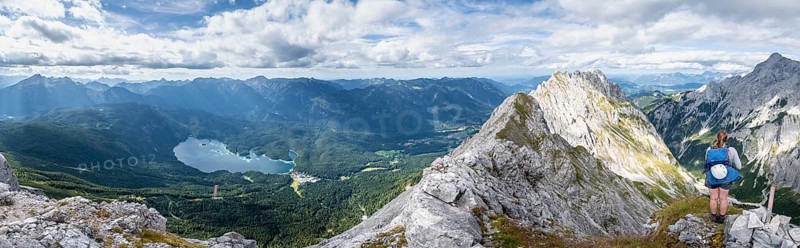 Alpine panorama, hiker, view of Eibsee lake and Werdenfelser Land, Wetterstein Mountains, Garmisch-Patenkirchen, Bavaria, Germany, Europe