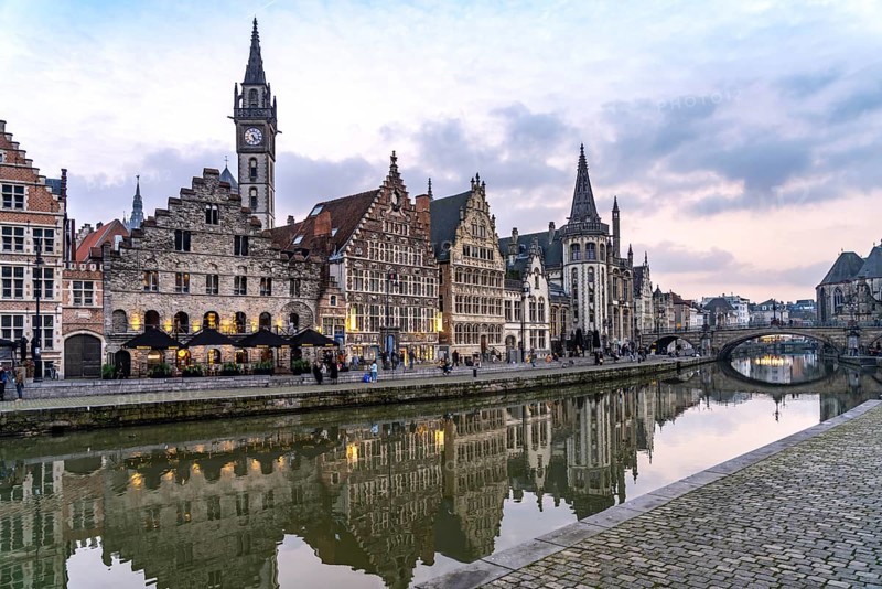 Medieval guild houses of Graslei Kai on the river Leie at dusk, Ghent, Belgium, Europe
