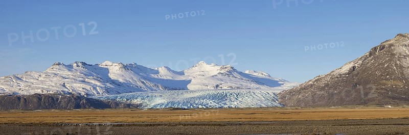 Aerial view over ice tongue Falljökull in winter, one of many outlet glaciers of Vatnajökull, Vatna Glacier, largest ice cap in Iceland, Austurland