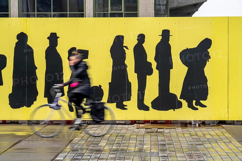 Mural on the Fenix 1 building, which is currently being converted into a museum and market hall, Emigration Museum, at the Rijnhaven in Rotterdam, Netherlands