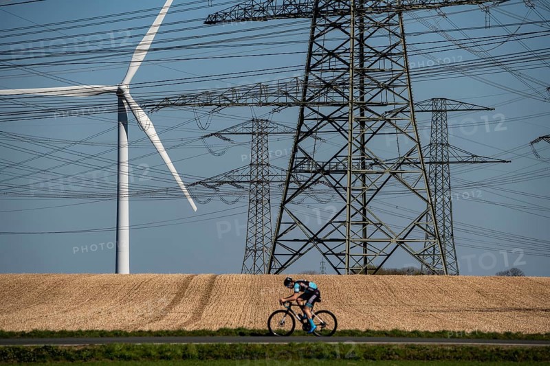 Part of a line route, 380 KV extra-high-voltage line, wind turbine, near Hüchelhoven, district town of Bergheim, Rhein-Kreis-Neuss, North Rhine-Westphalia, Germany, Europe