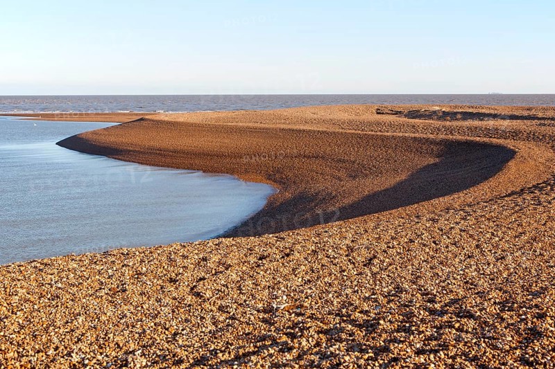 View out to North Sea from shingle beach at Shingle Street, Suffolk, England, UK