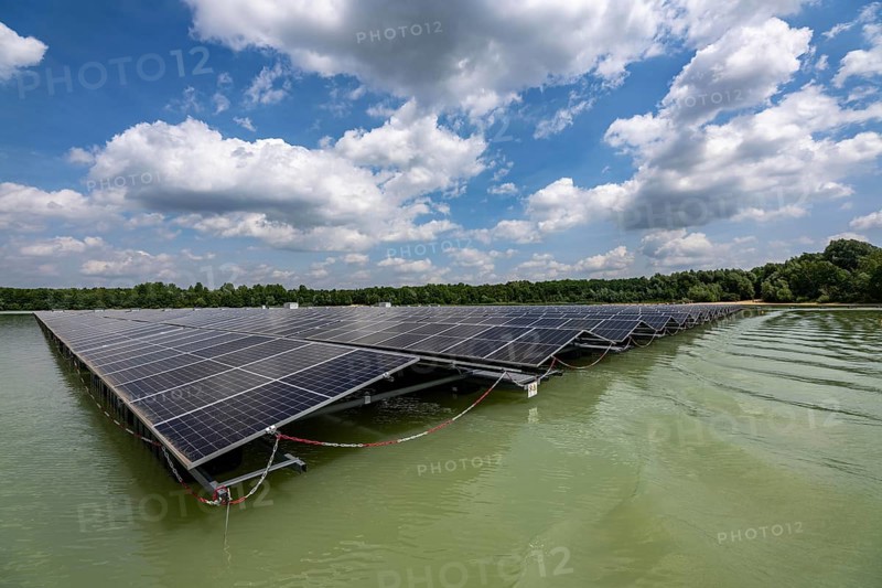Germany's largest floating solar power plant on the Silbersee III, a quarry pond no longer used for sand mining, near Haltern am See, operated by Quarzwerke GmbH, around 5800 solar modules, on an area of a good 2 football pitches, generate 3.1 megawatts of power, the company uses the electricity itself on weekdays, at weekends it flows into the public grid, North Rhine-Westphalia, Germany, Europe