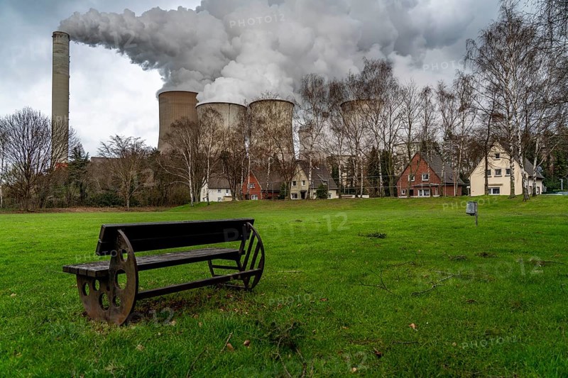 Lignite-fired power station, RWE Power AG NiederauÃŸem power station, Auenheim district, directly at the power station, sports ground, belongs to Bergheim, North Rhine-Westphalia, Germany, Europe