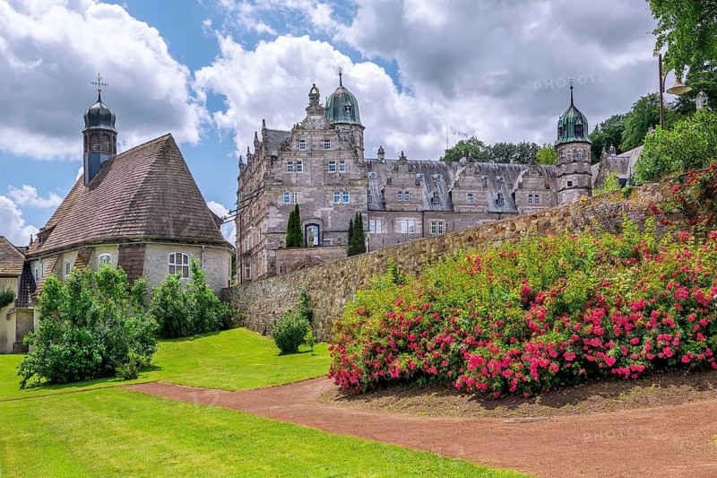 Garden with St. Mary's Castle Church and HÃ¤melschenburg Castle, Weser Renaissance castle, Emmerthal municipality, Emmer, Emmental, Weserbergland, Lower Saxony, Germany, Europe