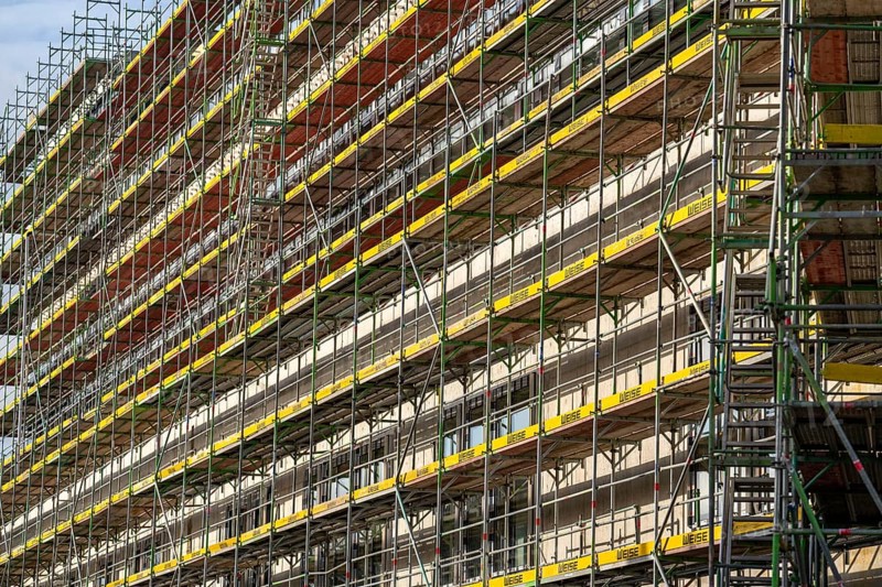 Large construction site, scaffolded shell of an office and commercial building complex, Bochum North Rhine-Westphalia, Germany, Europe