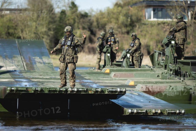 German soldiers of the NATO Response Force (NRF) train a water crossing with amphibious vehicles as part of the military exercise 'Wettiner Schwert' near Tangermünde, 26.03.2024. 'Wettiner Schwert' is part of the Quadriga exercise of the German Armed Forces and the NATO large-scale manoeuvre Steadtfast Defender 2024