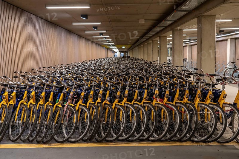 Bicycles at the OV-Fiets rental station, at Utrecht Central Station, hundreds of rental bikes waiting to be used, offer of the Dutch railway NS, for customers, low rental costs, available at almost every station, Utrecht, Netherlands