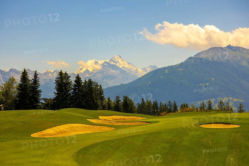 Crans Sur Sierre Golf Course with Hole 7 and Mountain View in Crans Montana in Valais, Switzerland, Europe