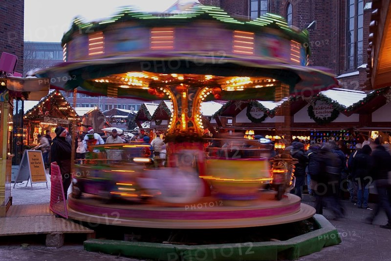 Europe, Germany, Hamburg, Christmas market in front of St Peter's Church, Children's carousel, Europe