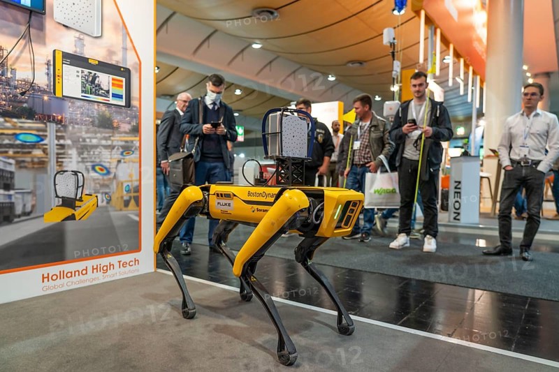 First day at Hannover Messe 2022, industrial trade fair, after a 2-year corona break, robot dog spot from Boston Dynamics, can be equipped with a wide variety of devices, e.g. for inspection in rooms, exhibition hall focussing on robotics, automation, plant engineering, Lower Saxony, Germany, Europe