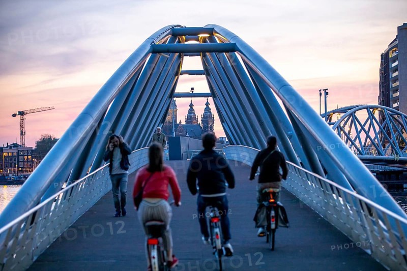 Amsterdam, Netherlands, bridge from the Nemo Science Museum to the city centre, St. Nicholas Basilica