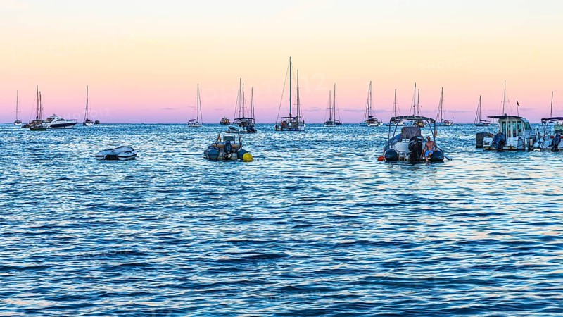 Sailing yachts to the blue hour in the bay of Talamanca, Eivissa, Ibiza Town, Ibiza, Balearic Islands, Mediterranean Sea, Spain, Europe