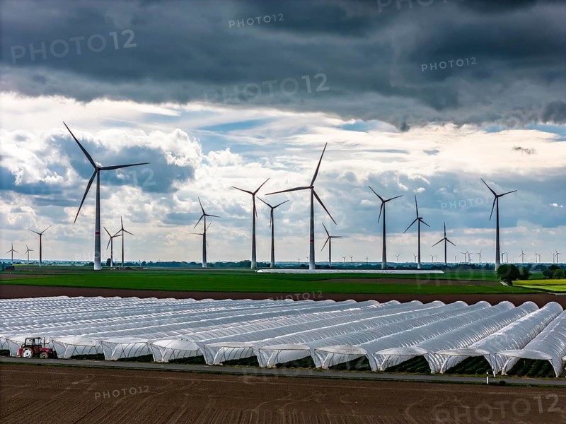 Agriculture, large areas with foil tunnel, for the cultivation of strawberries, freshly cultivated fields, wind farm, south of Lövenich, belongs to Erkelenz, in the district of Heinsberg