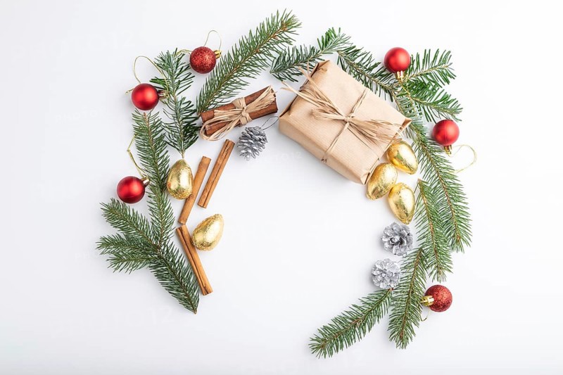 Christmas or New Year wreath composition. Decorations, balls, fir and spruce branches, on white background. Top view, copy space, flat lay