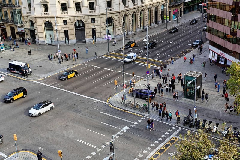 Crossroads with cars, taxis, pedestrians, view from above, Passeig de Gracia, Barcelona, Spain, Europe